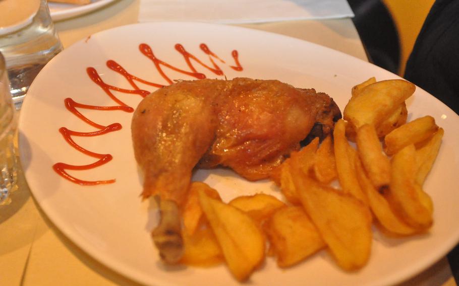 There's a small menu for cihildren at Rico's featuring items such as this leg of chicken with French fries.