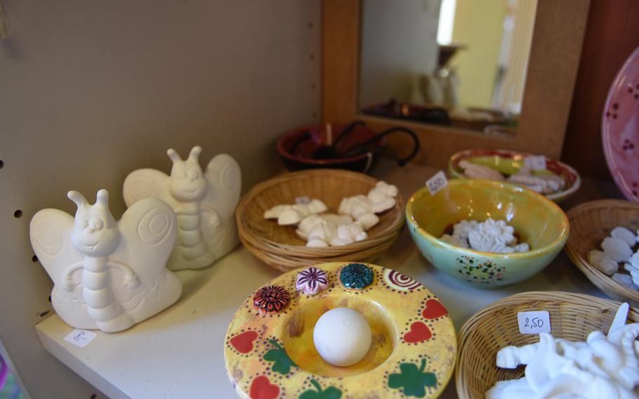 Little decorative items can be painted and attached to larger ceramic pieces at Mal-Werk in Mainz, Germany.