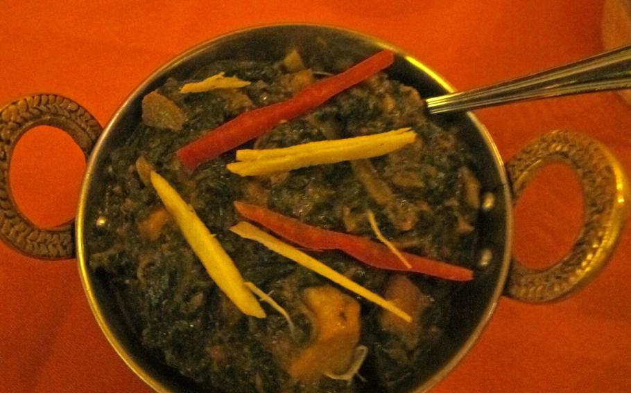 Spinach with potatoes at Buddha Restaurant in Vincenza is reminiscent of creamed spinach but far spicier.