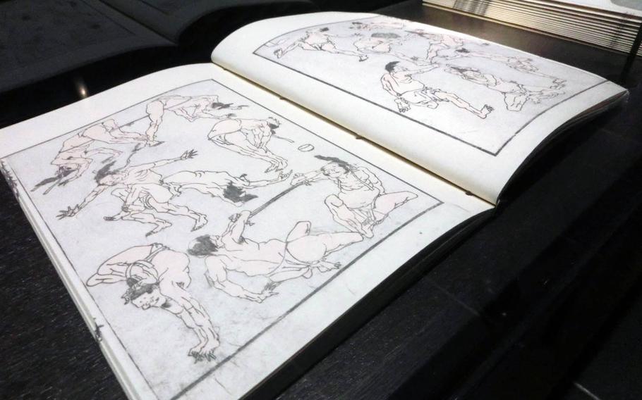 A replica of "Hokusai Manga" is displayed at the Sumida Hokusai Museum in Tokyo. The collection of sketches was published in 1814 and consists of landscapes, the supernatural and everyday life.