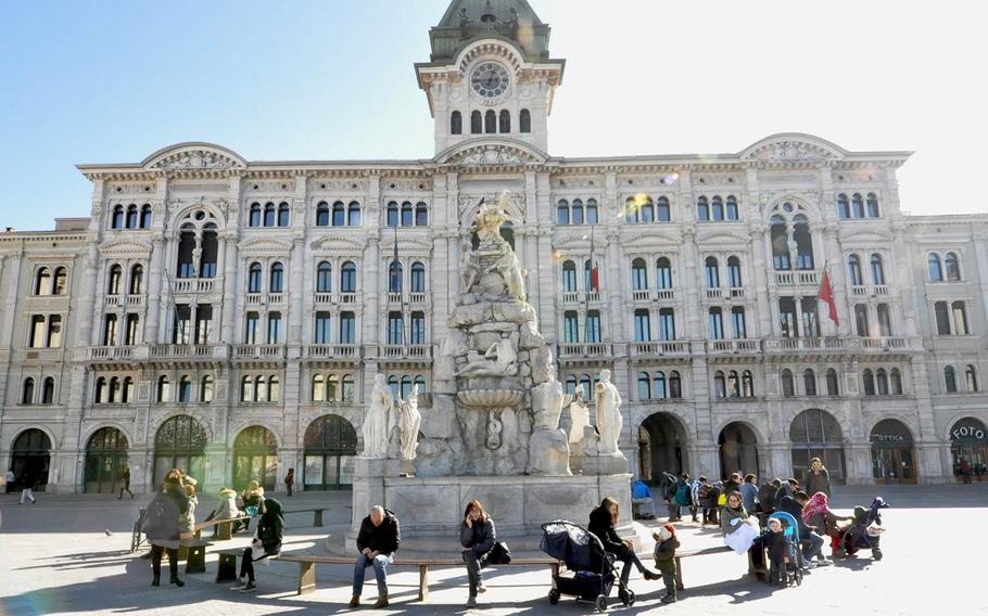 Locals enjoy a sunny day recently in the Piazza Dell Unita d'Italia in Trieste, Italy. 