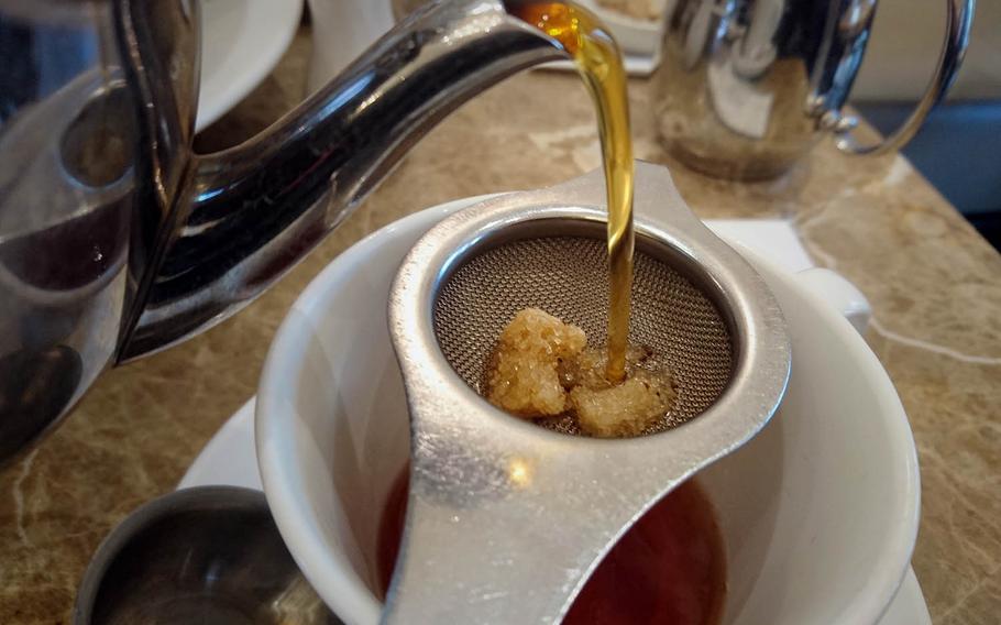 An afternoon tea at Harriets Cafe Tearooms in Bury St. Edmunds, Suffolk, England. The tearoom has a selection of 18 loose leaf teas. 