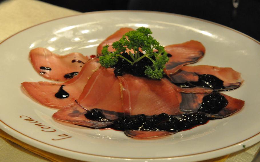 This appetizer option at La Conca featured cured ham topping a mound of rich cheese and topped with blueberries.