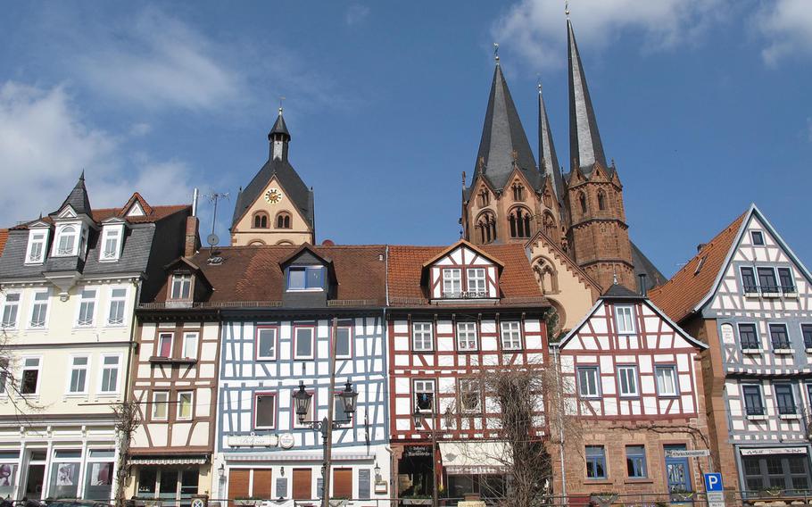 The Untermarkt in Gelnhausen, Germany, is lined with half-timbered houses. In the background is the Marienkirche, or St. Mary's Church.
