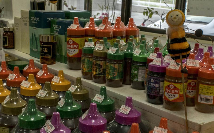 There is an English guide to help servicemembers navigate through items for sale at Kohamas Honey on Okinawa. Each bottle of honey is color coded. Orange labels indicate it 100 percent Okinawan honey.