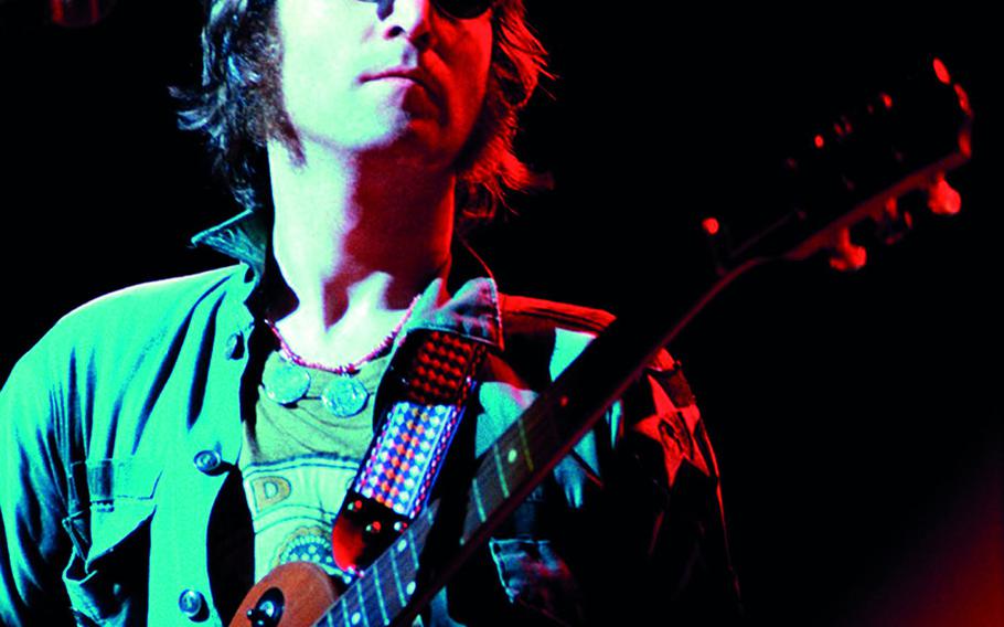 Bob Gruen photo. John Lennon performs during the One to One concert, a children's charity event on Aug. 30, 1972, in Madison Square Garden, New York City.