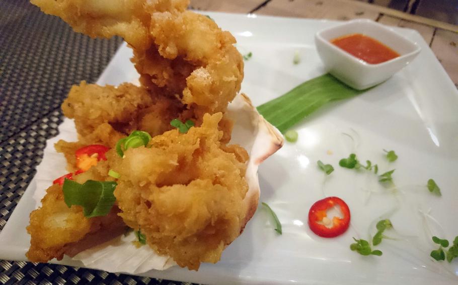 The salt and pepper squid appetizer from the Giggling Squid restaurant in Bury St. Edmunds, Suffolk, Tuesday, May 2, 2017. It was well battered and crunchy on the outside and the squid was very tender with a spicy kick in the aftertaste.