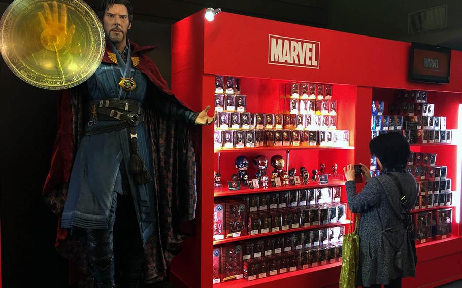 THe Hot Toys store at Marvel's Age of Heroes exhibit in Tokyo offers action figures, masks, statues and other memorabilia.