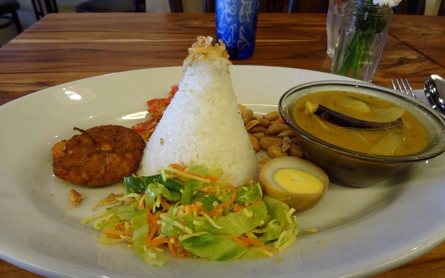 Nasi Campur is a sampler plate of Balinese dishes offered at Bali Noon Bali Moon, one of the few restaurants where diners can enjoy authentic Balinese cuisine on Okinawa.