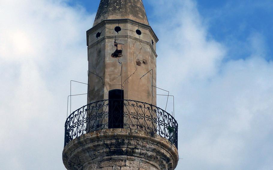 The minaret of the Aga mosque in Chania, Crete. Chania has been ruled by the Romans, Byzantines, Venetians, Ottoman Turks and others over the centuries.