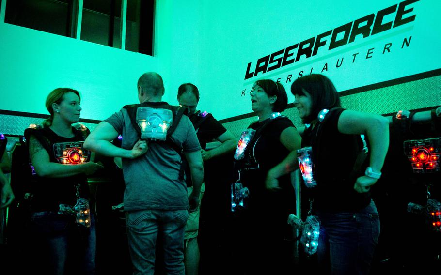 Players gear up before a round of laser tag at Laserforce.
