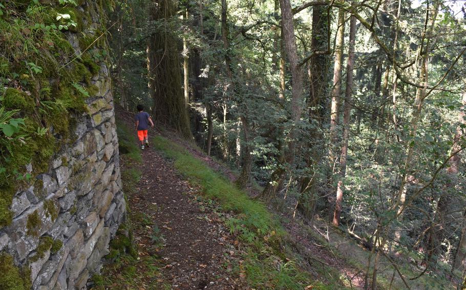 A series of switchbacks crisscross the hillside below the Altwolfstein castle ruins in the forest near Wolfstein, Germany.