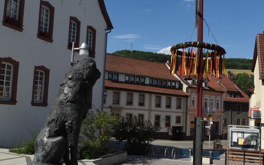 A statue of a wolf marks the town center of Wolfstein, Germany.