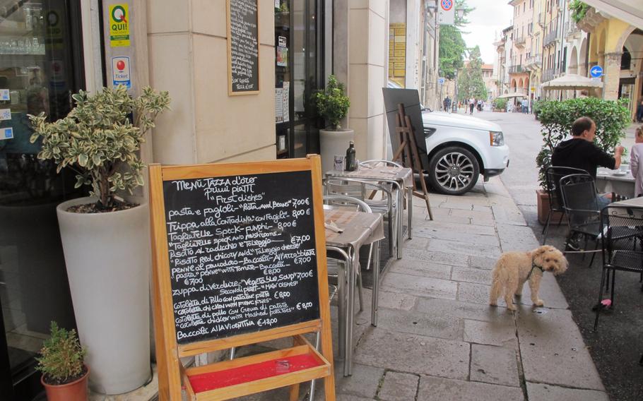 CaffeTazzo D'oro posts its menu of seemingly homey dishes on chalkboards to entice passersby.