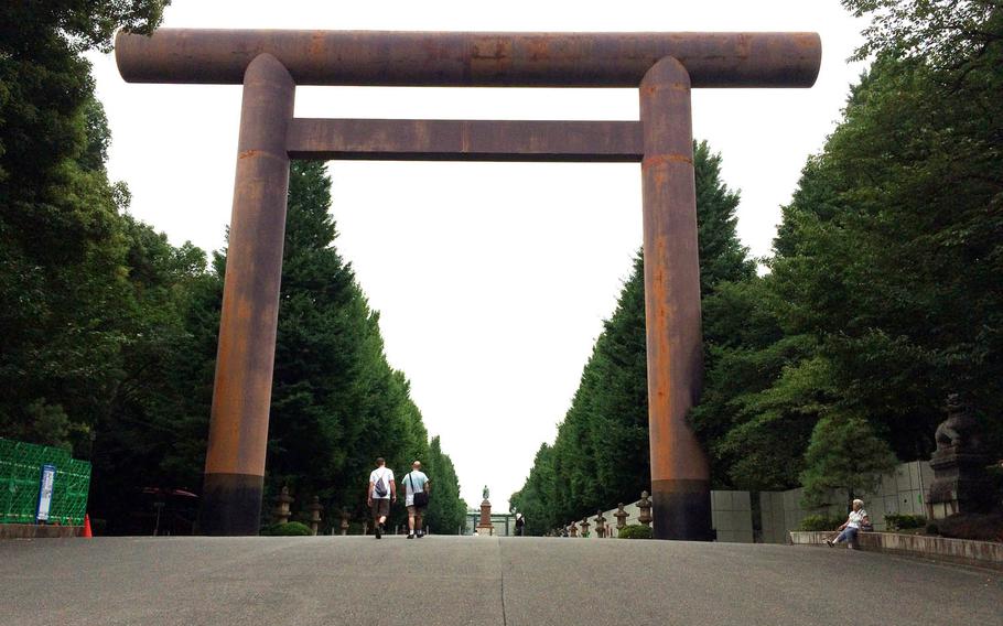A massive torii gate leads visitors to the controversial Yasukuni Shrine in central Tokyo.