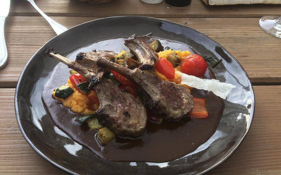 Lamb cutlets at Berggasthof Kellerskopf, a rustic restaurant and beer garden set in the wooded hills just outside Wiesbaden, Germany. Adjacent to the restaurant is an observation tower which offers a 360-degree view of the countryside and Rhine valley.