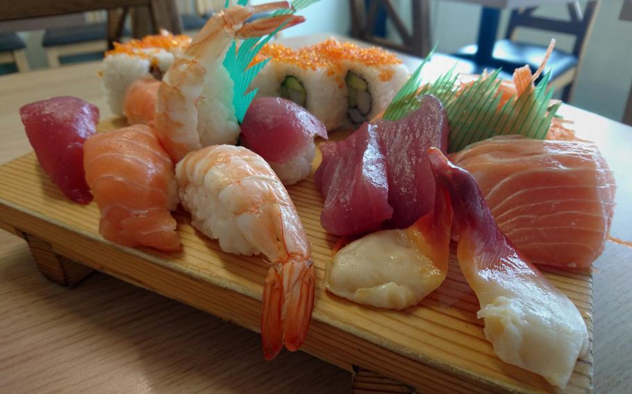 A sushi and sashimi deluxe order from the Tokyo Oysy Sushi restaurant in the village of Beck Row, England. The 20-piece chef?s choice platter costs 18.50 pounds (24.60 dollars).