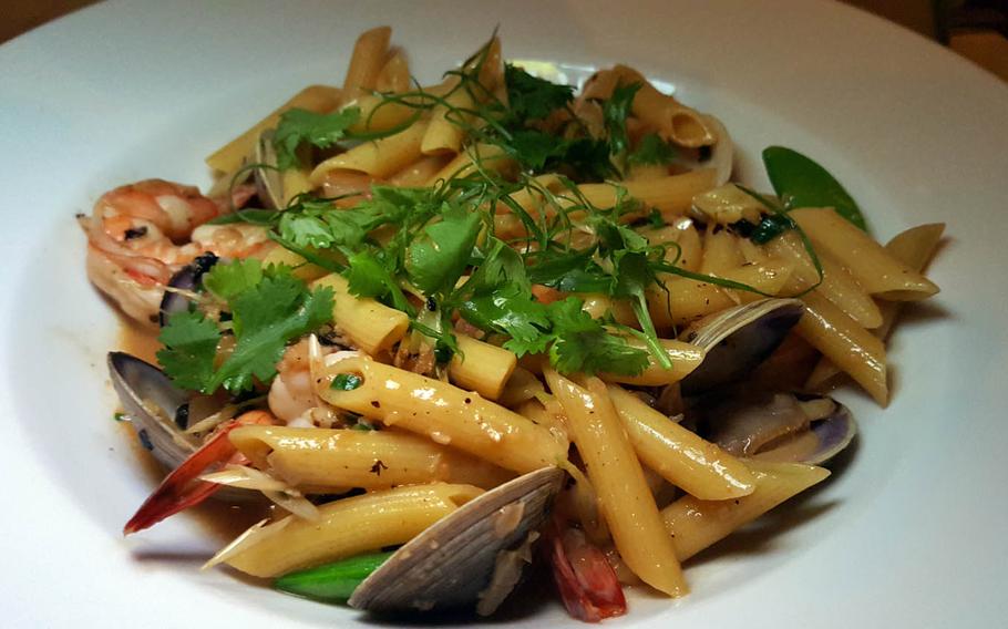 The shrimp and clams penne from Alan Wong's in Honolulu is steeped in a black bean sauce infused with chili, garlic and lemongrass.