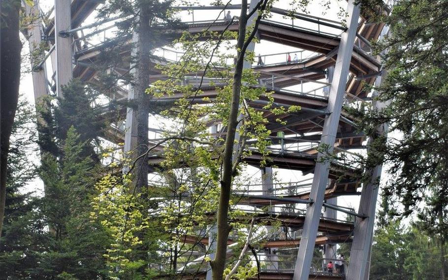 A spiral observation tower awaits at the end of the Baumwipfelpfad treetop walk in Bad Wildbad, Germany.