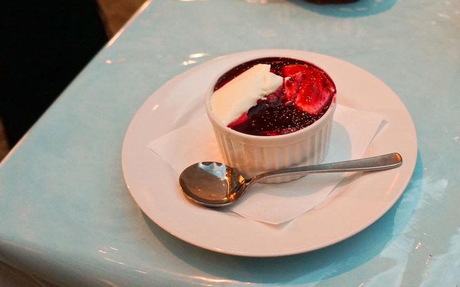 Padrino del Shozan's panna cotta is served with a delicious raspberry sauce.