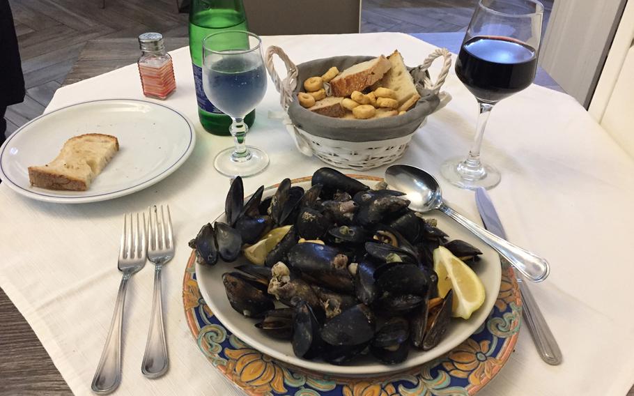 A heap of sauteed peppered mussels is a first course at Pruneto 1944 in the Posillipo neighborhood in Naples, Italy. The atmosphere is elegant but relaxed.