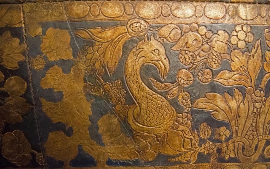 A detail showing a bird adorns historic leather wallpaper in the former residence of the von Greiffinclau family at Schloss Vollrads near Wiesbaden.  