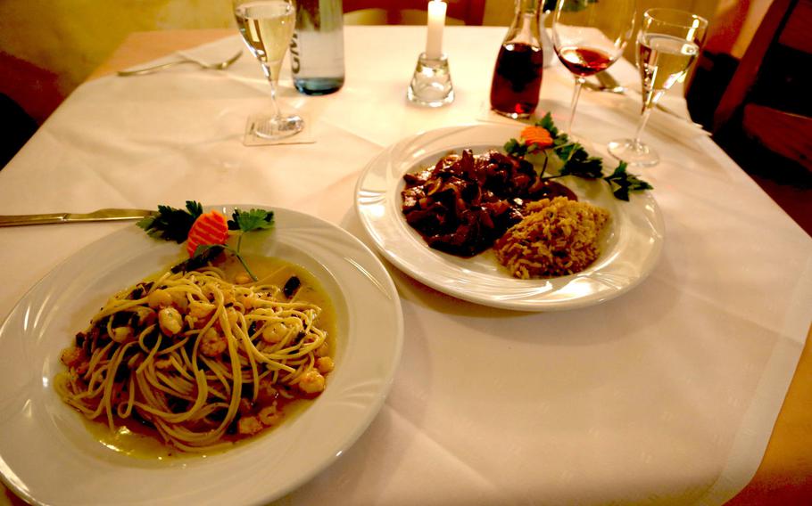 Plates of Spaghetti alla Chef and liver cooked in white wine sauce await diners at  Pizzeria Ristorante Da Enzo in Otterbach, Germany. The restaurant has a large selection of Italian dishes, pizza and great service. Unfortunately the pasta dish tasted like salad shrimp dumped on a pile of pasta.