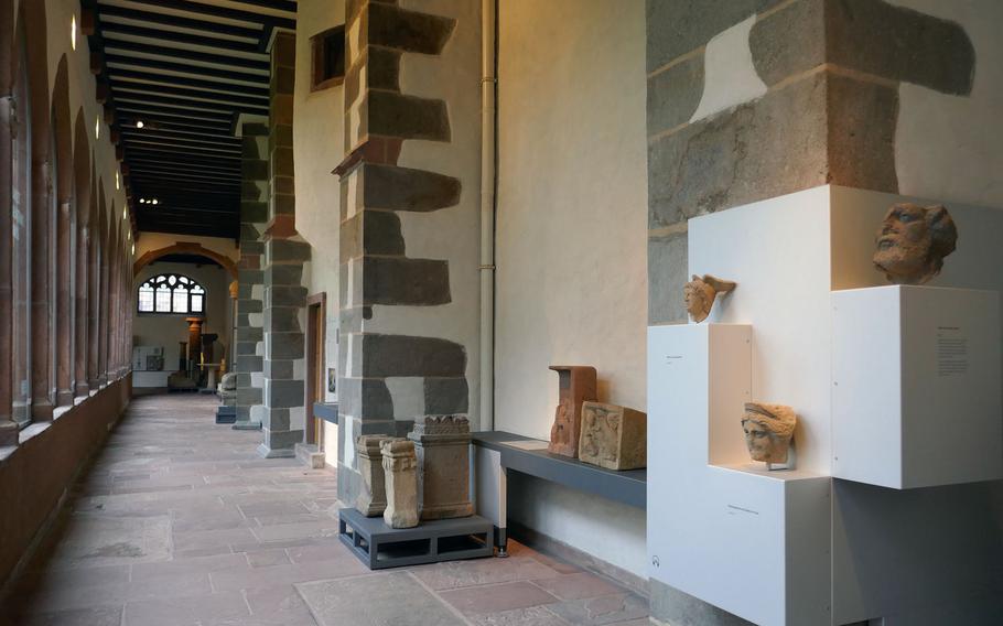 Roman artifacts line the walls of the cloister at the Archaeological Museum in Frankfurt, Germany. The museum is housed in the city's former Carmelite monastery.