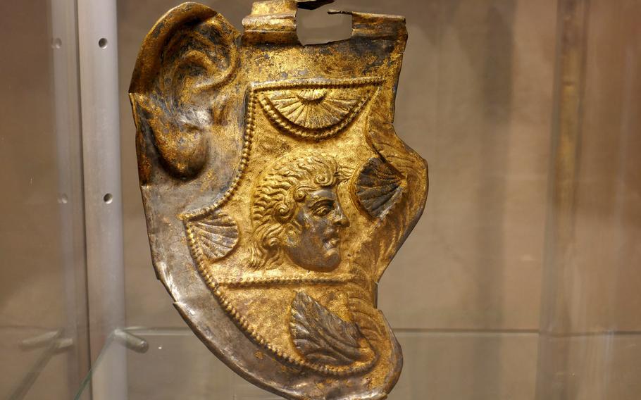 The cheek guard from a Roman legionnaire helmet on display at the Archaeological Museum in Frankfurt, Germany. Found north of central Germany's Lahn River, it probably dates to the time of Ceasar Augustus, during the Roman invasion of Germanic tribal lands.