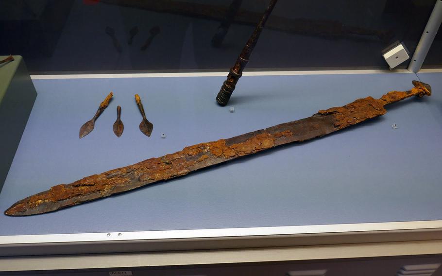 A sword and arrowheads found in the grave of a 6th-century man in central Germany is on display at the Archaeological Museum in Frankfurt, Germany. The museum's displays range from prehistory to the early Middle Ages.