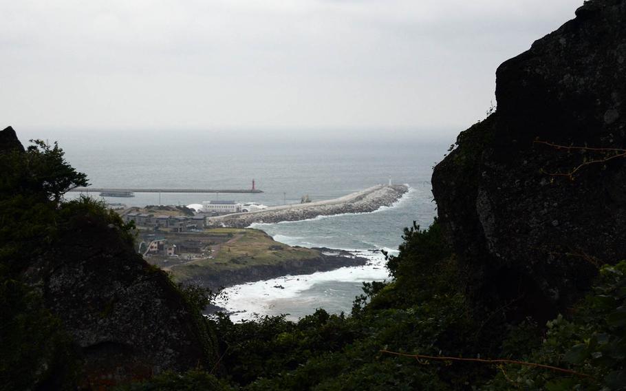 The view from near the top of Seongsan Ilchulbong, also called Sunrise Peak, which was created by a volcanic eruption under the sea. It was a stop on the UNESCO World Heritage tour on Sunday, Oct. 15, 2017, on Jeju Island, off the southern tip of South Korea.