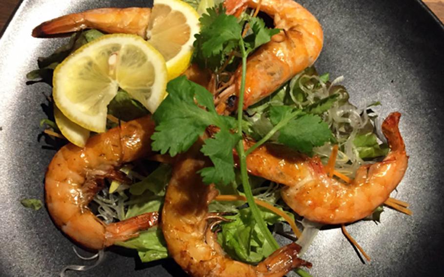 Smoke Camp's whole charcoal-grilled shrimp will melt in your mouth.