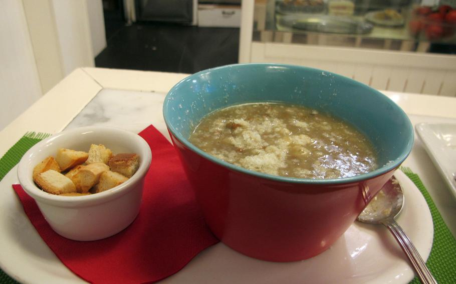 Caffe Natura in Vicenza, Italy, always has soups, including lentil soup, served dusted by Parmesan and served with croutons.