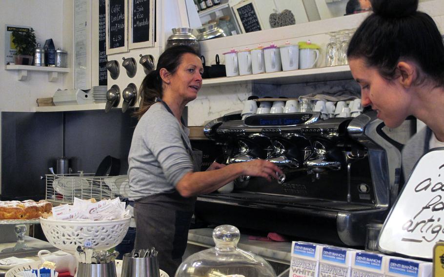 Caffe Natura in Vicenza, Italy, is owned by Sabrina Berlato, left, and staffed exclusively by women, including Berlato's daughter, Chiara, right.