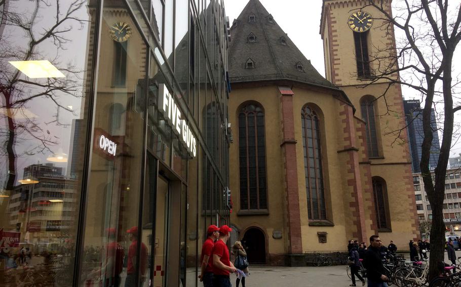 The exterior of Five Guys in Frankfurt, Germany. The chain's first German location is in the heart of Frankfurt's pedestrian Zeil district.