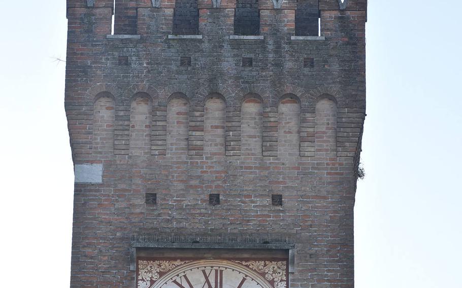 The clock tower that tops the original city hall in Oderzo, Italy, rises above the piazza that runs in front of the Duomo and is one of a series of squares that serve as the heart of the city.