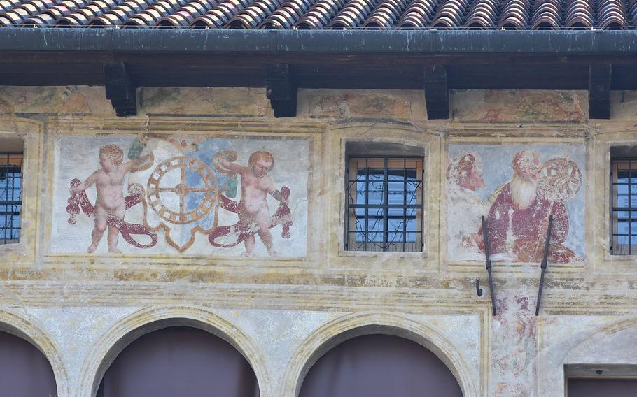 Frescoes adorn the exterior of a building in downtown Oderzo, italy.