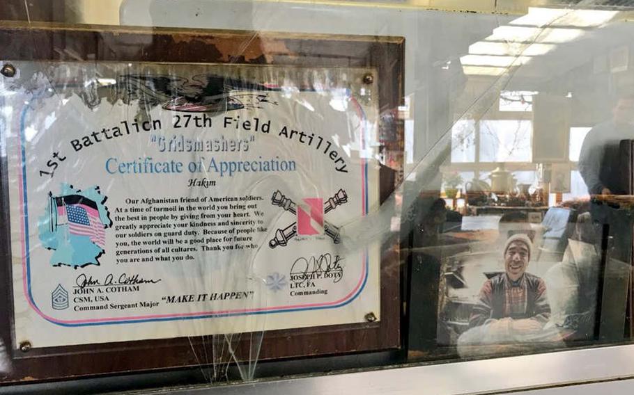 A certificate of appreciation to Hakim, "our Afghanistan friend of American soldiers" is displayed in the window of the recreational vehicle that serves as a kitchen at Hakim's Imbiss and Steak House, Heidelberg, Germany.