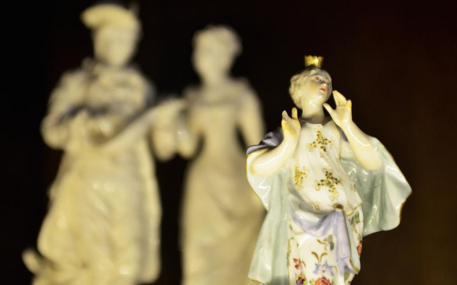 Porcelain figures from a display case inside the drawing room of Oxburgh Hall in Oxborough, England. Each room of the stately home offers a snapshot of history.