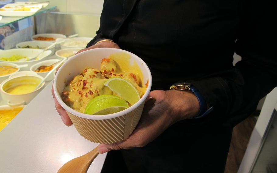 Khao-suey, a Burmese soup redolent of chicken curry, coconut broth and fresh lime, is made using a recipe from Ameen's father's one-time fiancee's uncle.