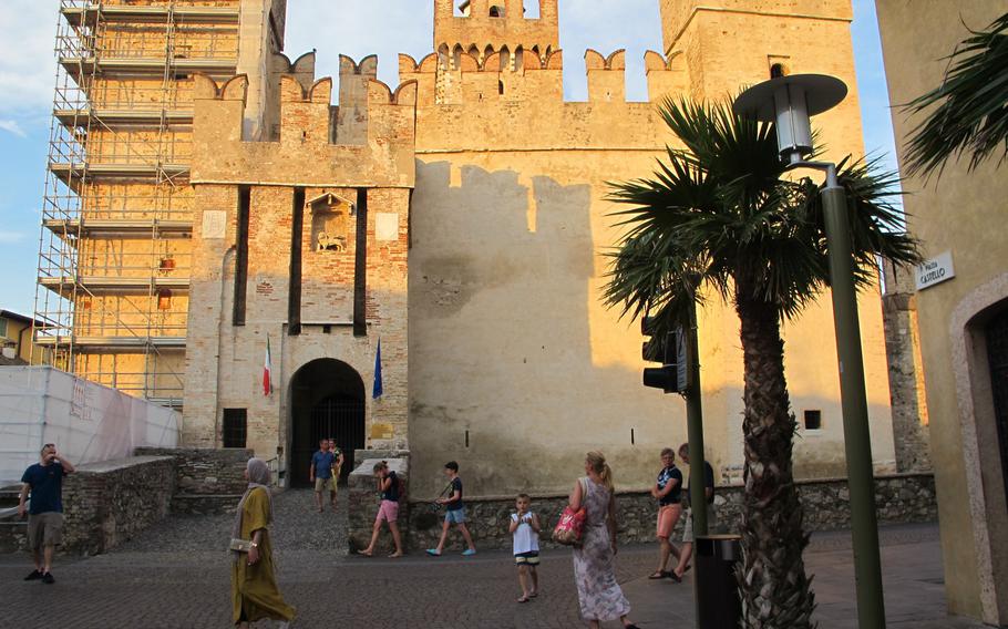 The 13th-century Scaliger castle ruin, built by Veronese nobles, guards the only bridge into Sirmione with its crenellated turrets and towers. Now a resort town, Sirmione for a century served as a defense and control garrison for the ruling nobles.