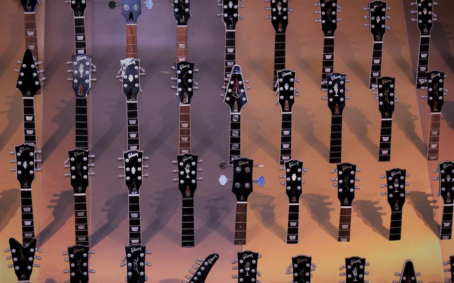 Guitars and other musical memorabilia cover the walls and hallways of the original Hard Rock Cafe in the West End of London.