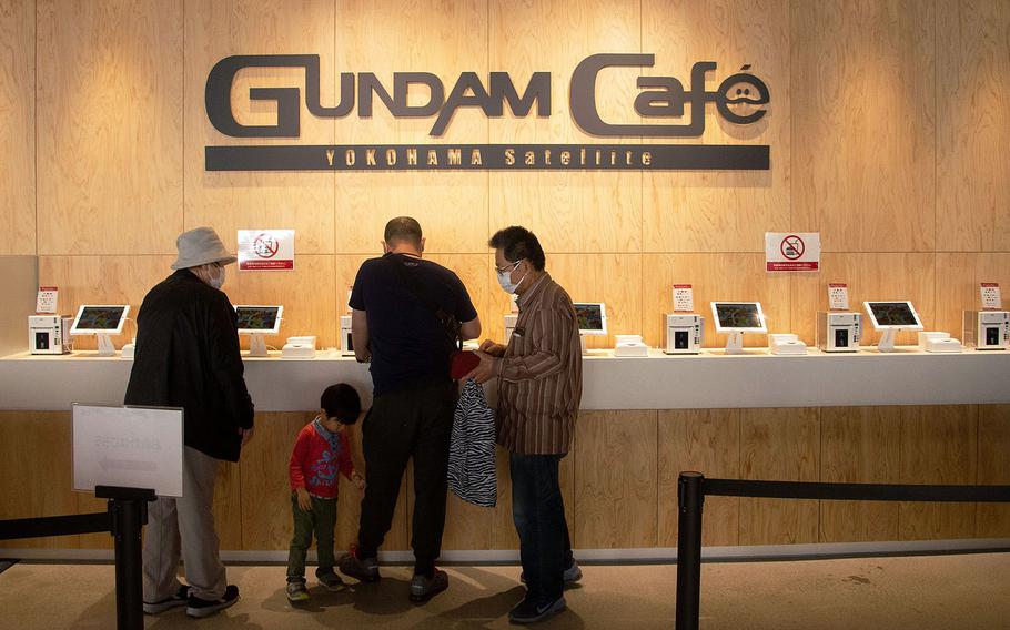 Gundam Cafe inside the dock area at Gundam Factory Yokohama serves a variety of burgers, pasta dishes and beverages.