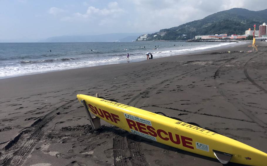 The surf is not extreme at Yugawara Beach in Kanagawa prefecture, Japan, but lifeguards are on hand just in case. 