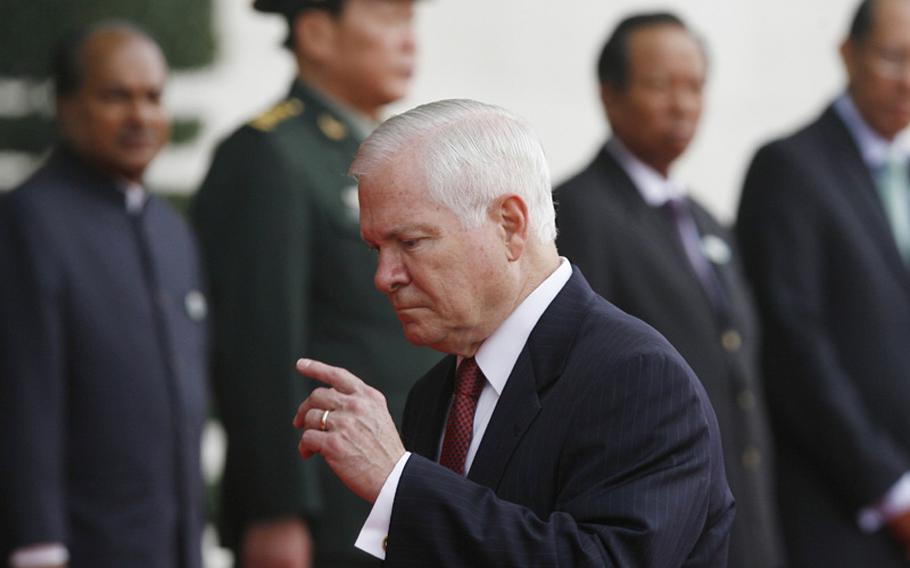 In this Oct. 12, 2010, file photo, U.S. Defense Secretary Robert Gates attends the Association of Southeast Asian Nations (ASEAN) Defense Ministers Meeting Plus in Hanoi, Vietnam.  Gates said Sunday that U.S. intelligence underestimated how fast China was developing a stealth-capable fighter, but gave reassurance he has been monitoring its progress.