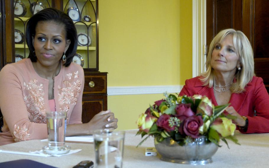 First lady Michelle Obama and Dr. Jill Biden, wife of Vice President Joe Biden, listen to a question about the Joining Forces program for military families Tuesday at the White House.