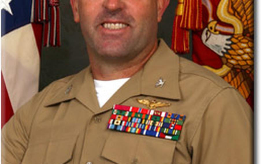 Marine Col. Jeffrey Woods was relieved of duty on Wednesday.