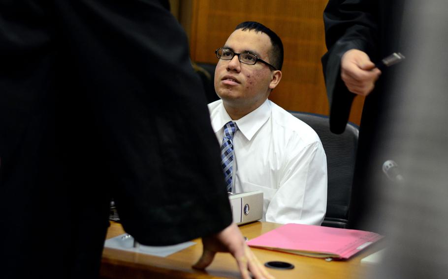 U.S. Air Force Senior Airman Edgar Veguilla, one of the airmen wounded while boarding a bus at Frankfurt Airport in March, prepares to testify Monday afternoon in the trial of Arid Uka, the 21-year-old Kosovo Albanian charged with two counts of murder and three counts of attempted murder.