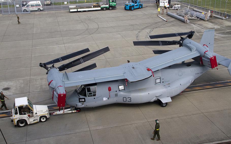 A Marine MV-22, or Osprey, is unloaded at Marine Corps Air Station Iwakuni on July 23, 2012.