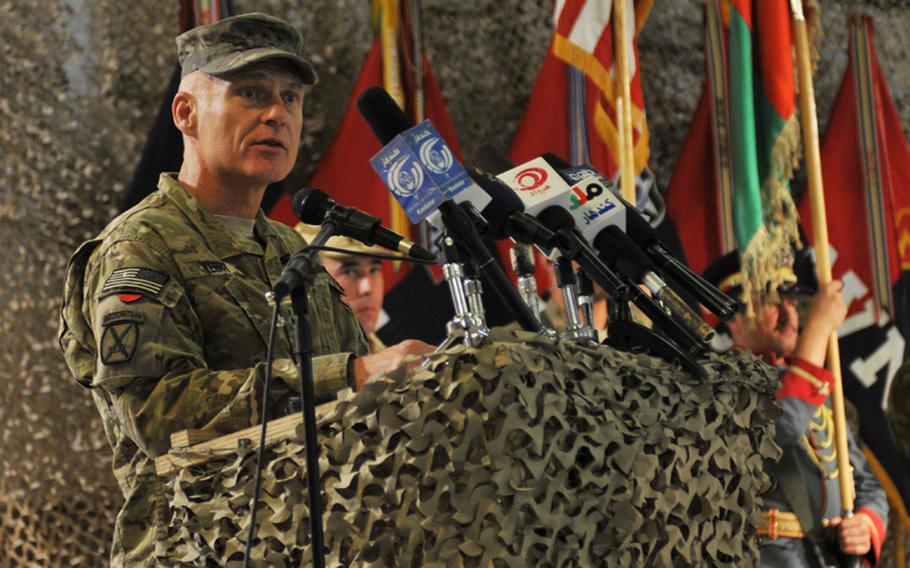 U.S. Army Lt. Gen. James L. Terry, commanding general International Security Assistance Force Joint Command, speaks to NATO force members, Afghan National Security Force members, and Afghan government officials during the Regional Command-South Transfer of Authority Ceremony at Kandahar Airfield, Sept. 2, 2012.